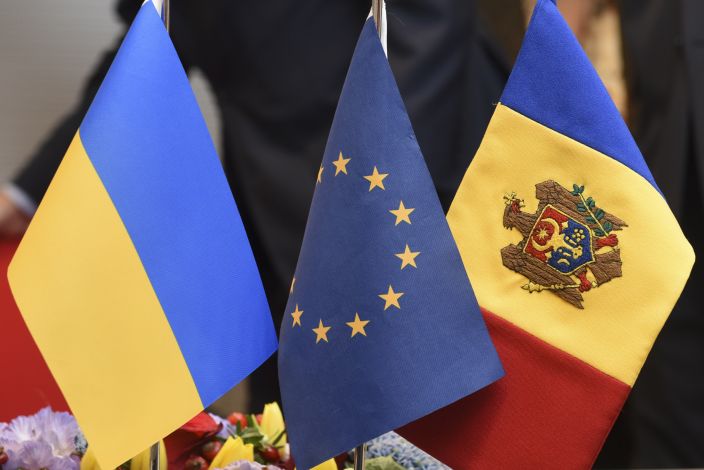 EU flag with Ukraine and Moldovan flags 