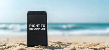 Phone abandoned on a beach